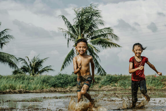 Kids playing at the crop field in Malaysia